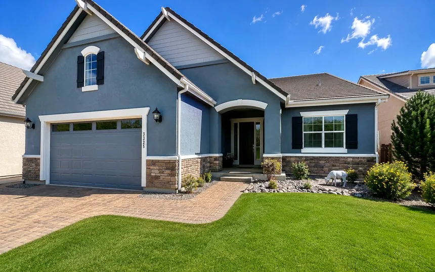 Slate-blue craftsman home with fresh exterior paint